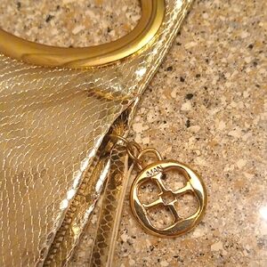 IMAN Unique Gold Snakeskin Design Print  Cluth Or Wristlet. NWOT